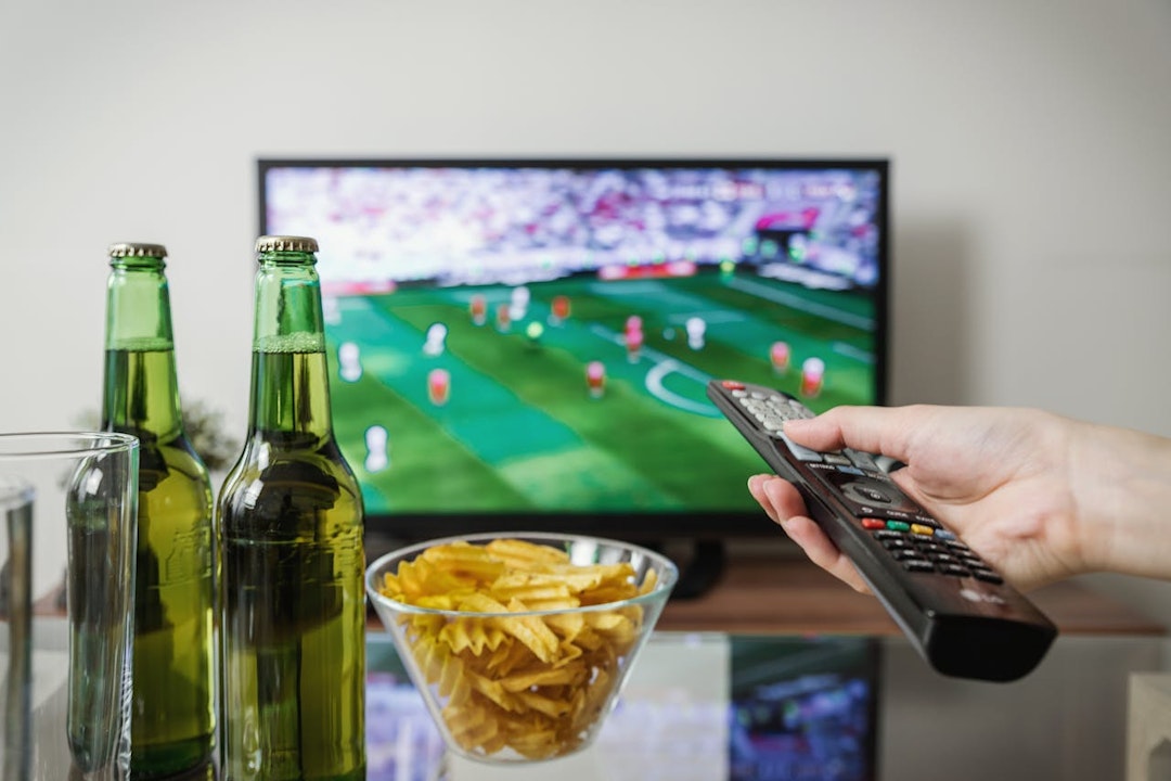 Apostador vendo jogo de futebol