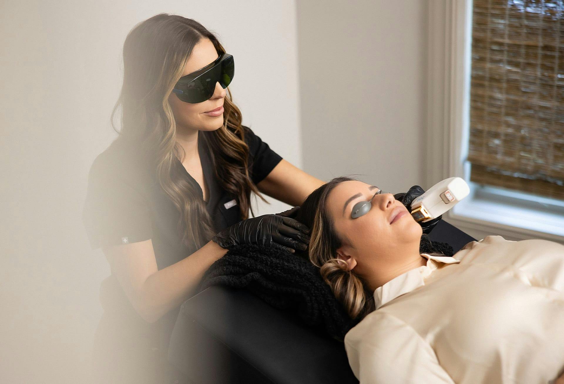 woman receiving laser treatment