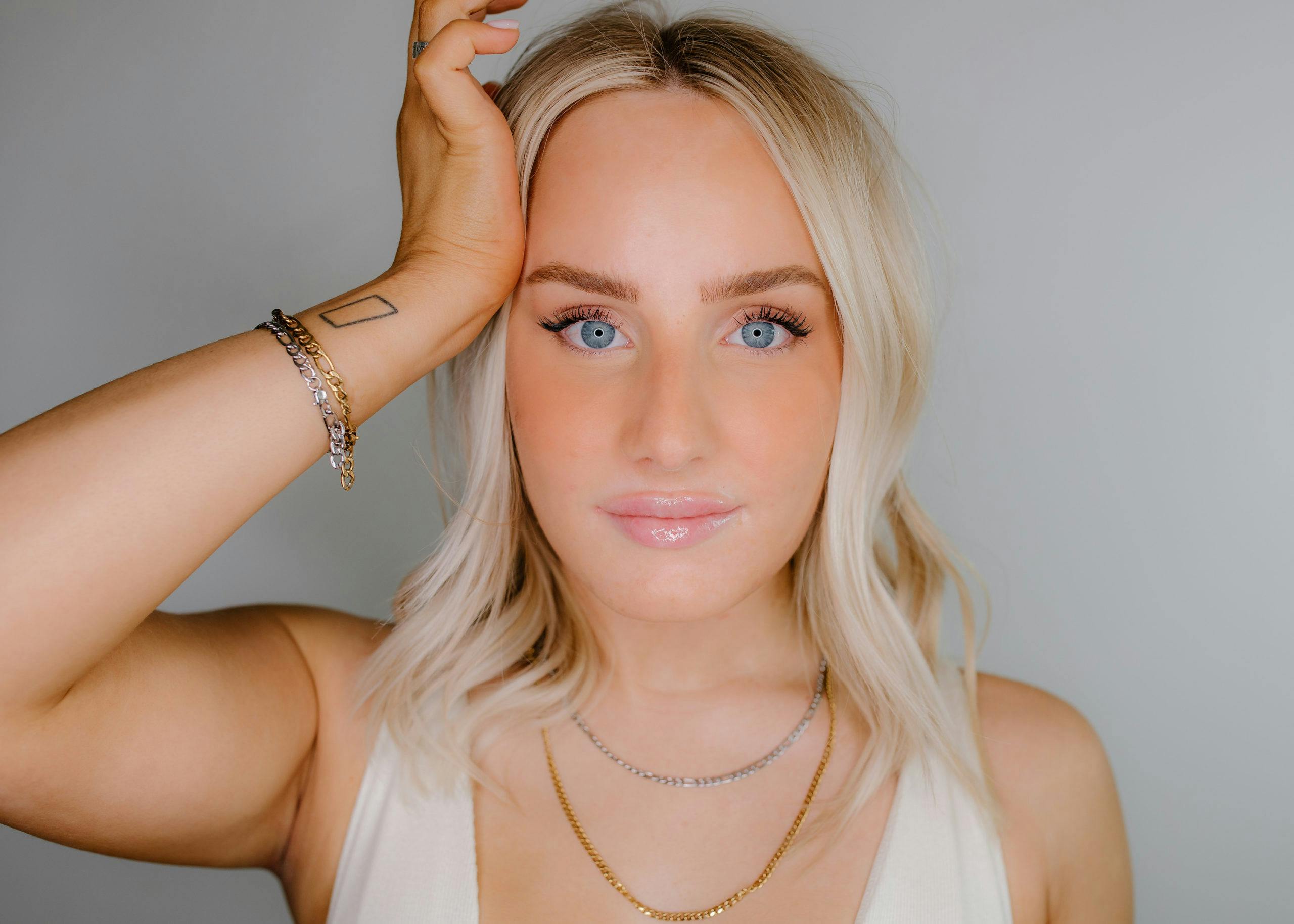 woman with blonde hair and blue eyes