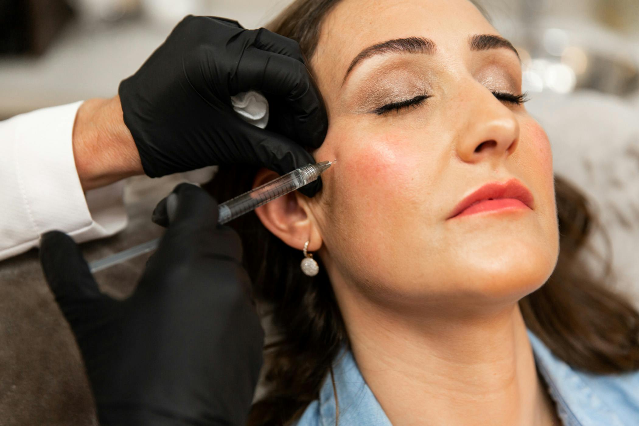woman getting an injectable treatment