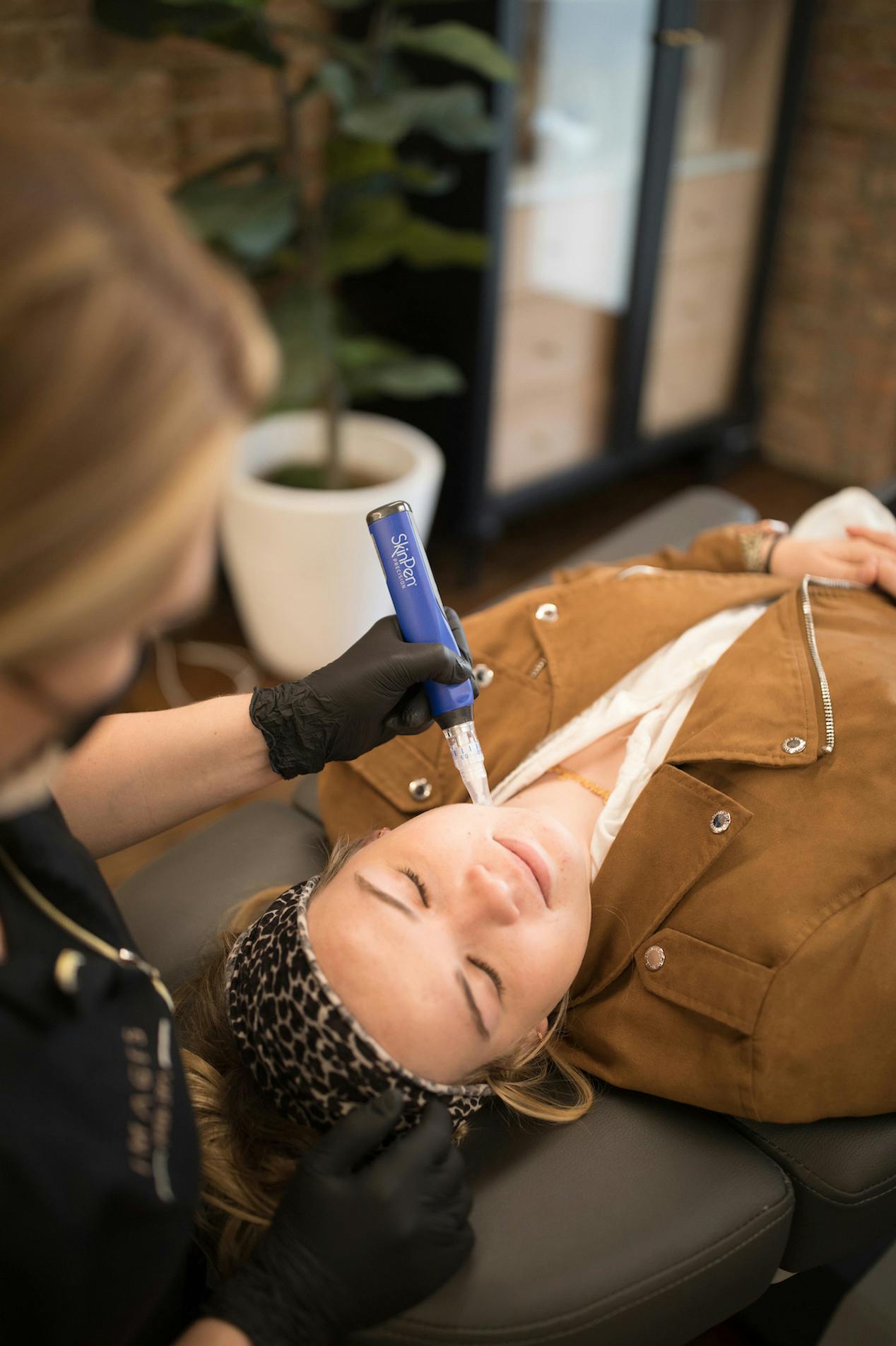 woman getting a facial procedure