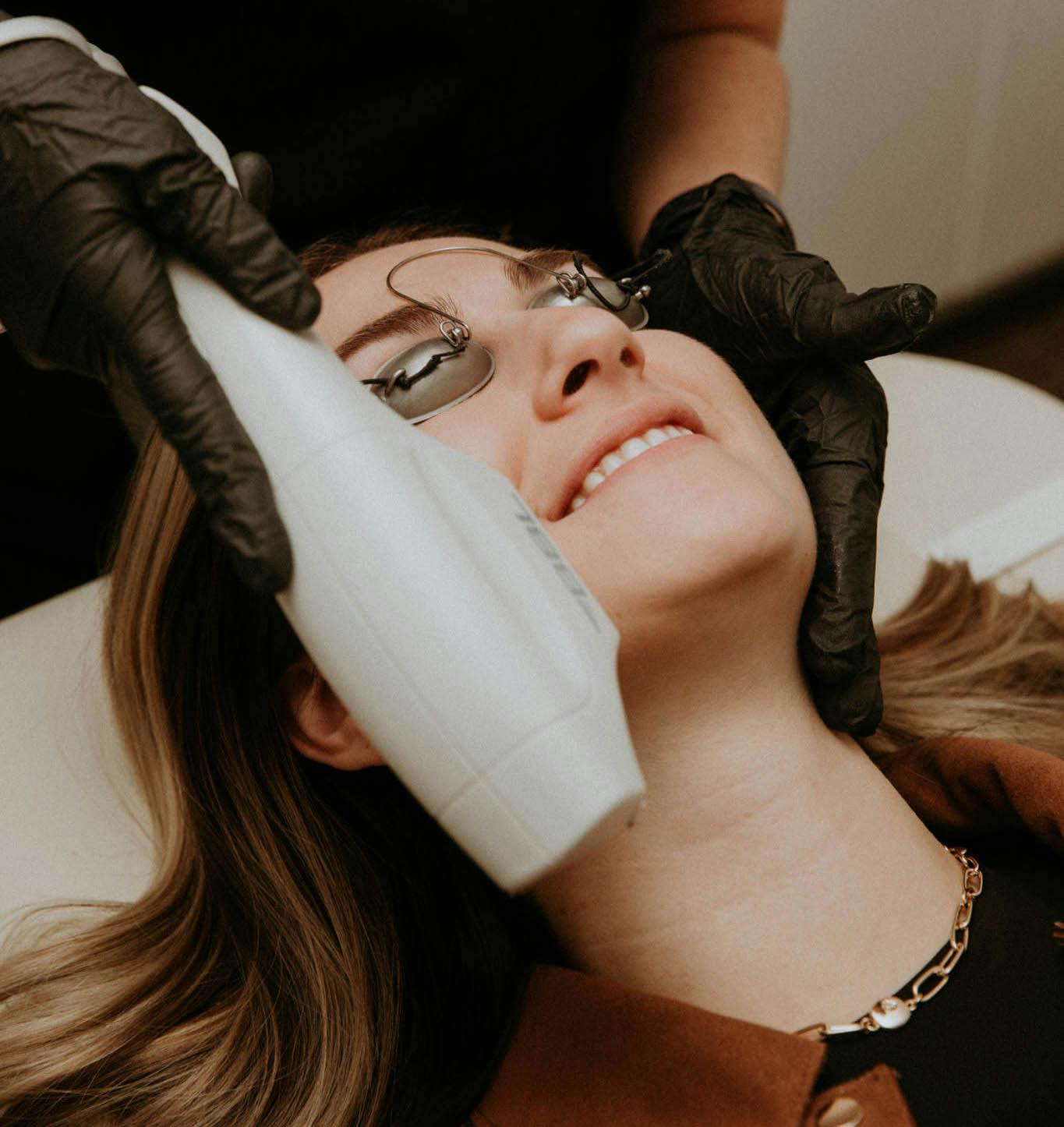 woman getting a facial treatment