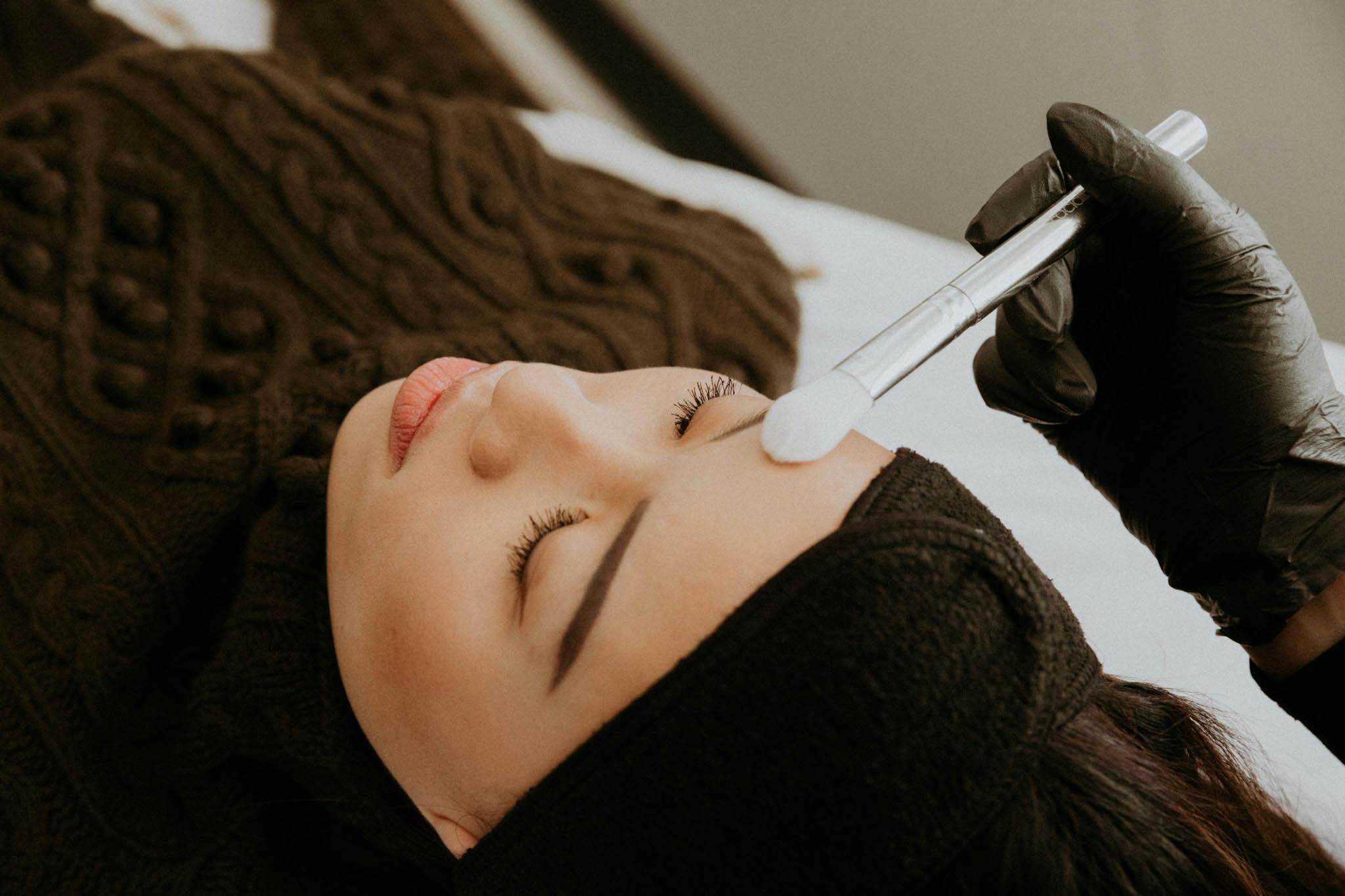 woman getting a facial procedure