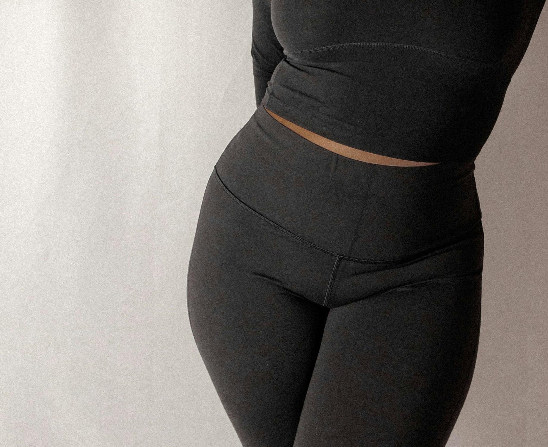 woman in black leggings