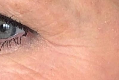 there is a close up of a woman's eye