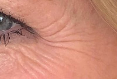 there is a close up of a woman's eye