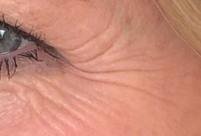 there is a close up of a woman's eye
