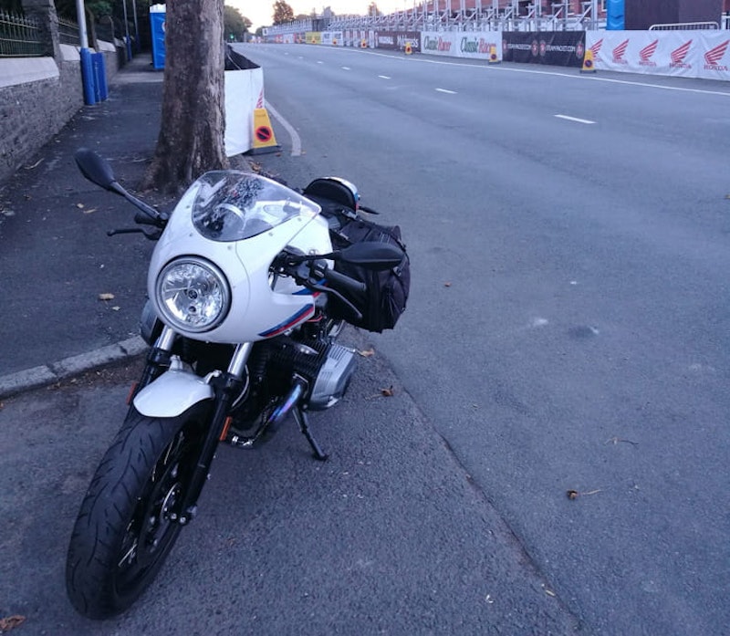 The BMW 2017 R NineT Racer on the start finish straight on the IOM TT course