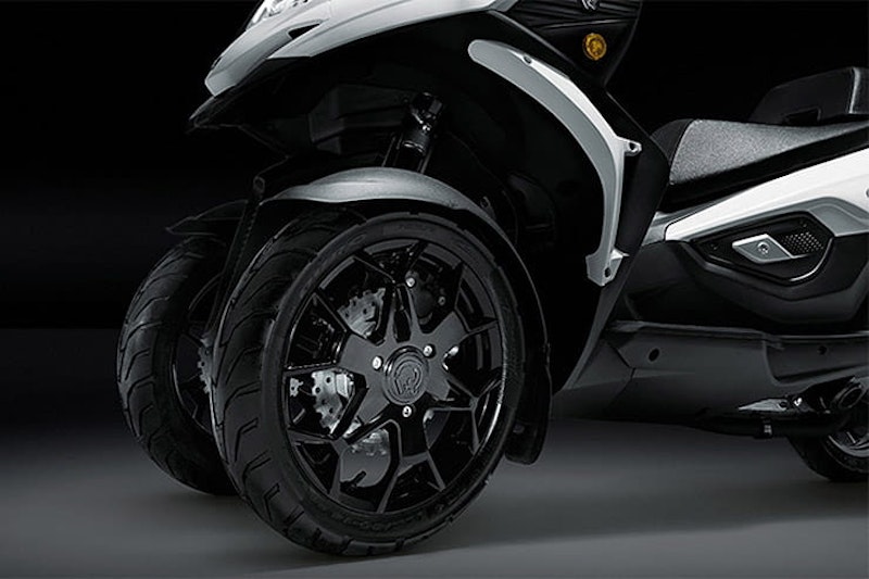 Four-wheel scooter promises twice as much grip as a two-wheeler. The 350cc, single cylinder engine makes 30bhp and it can be ridden on a car licence