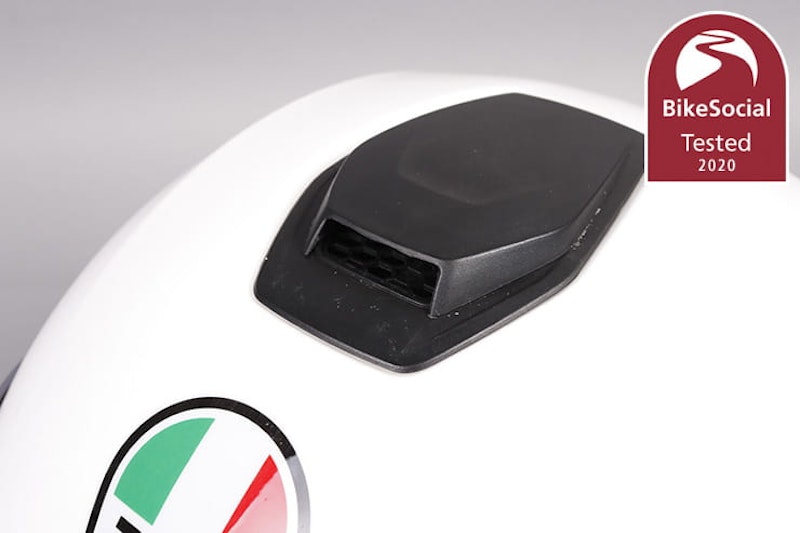 Tested: AGV Sport Modular flip-front helmet review. Can it beat the Shoei Neotec II and the Schuberth C4 Pro as the best flip-up lid?