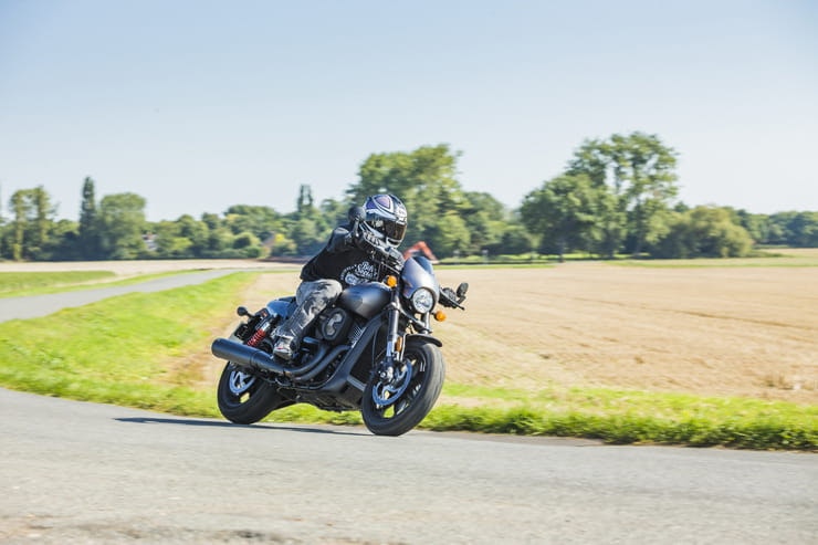 2017 Harley-Davidson Street Rod cornering on a fen road