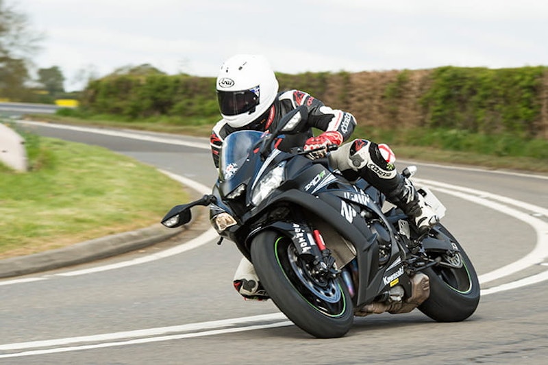 Kawasaki ZX10RR Ninja ridden in the sunshine on a country lane