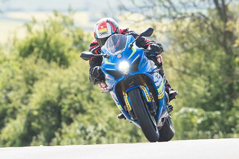 Suzuki GSX-R1000 ridden over the brow of a hill