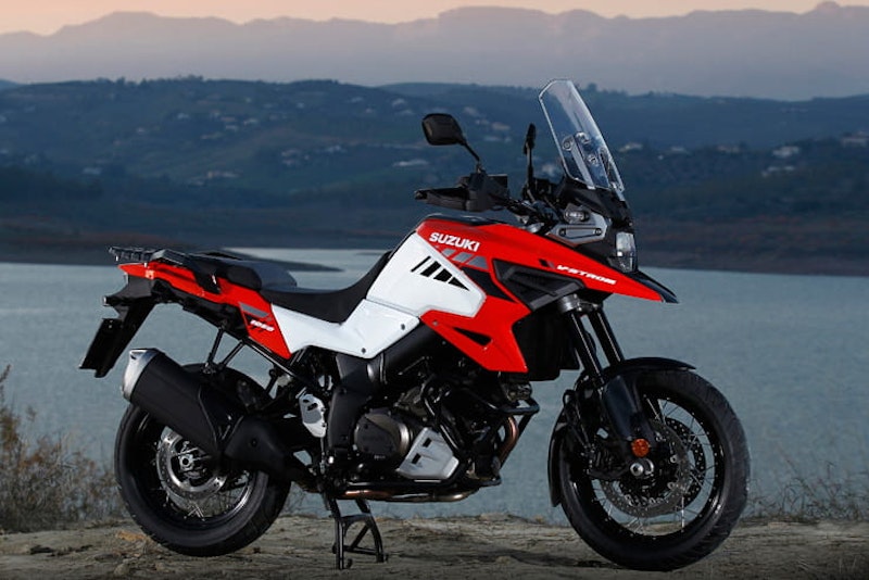 The three new 2020 ‘mid-range’ adventure bikes from Honda, Triumph and Suzuki go head-to-head, on and off-road. We also look at their rivals.