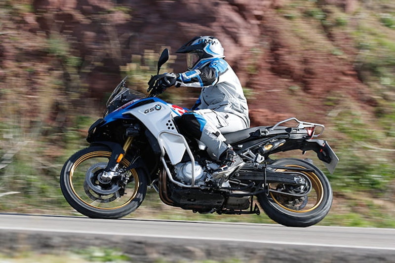 The three new 2020 ‘mid-range’ adventure bikes from Honda, Triumph and Suzuki go head-to-head, on and off-road. We also look at their rivals.