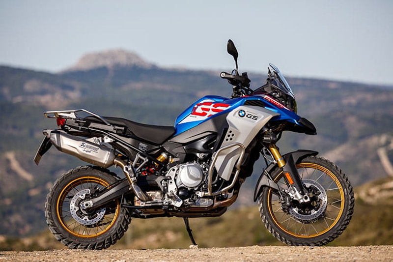 The three new 2020 ‘mid-range’ adventure bikes from Honda, Triumph and Suzuki go head-to-head, on and off-road. We also look at their rivals.