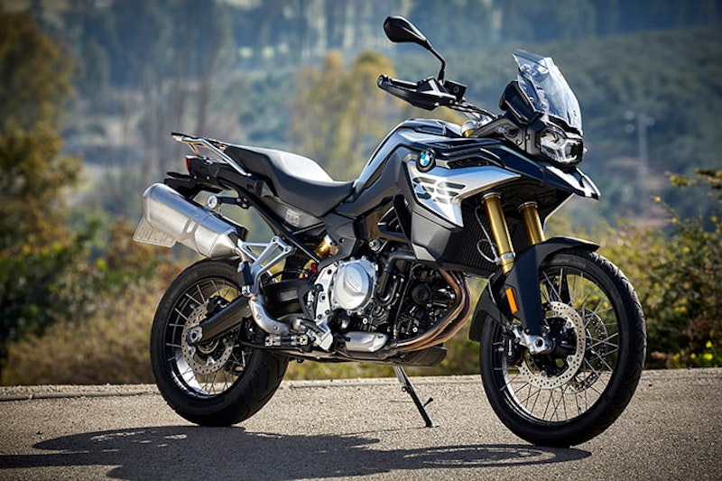 The three new 2020 ‘mid-range’ adventure bikes from Honda, Triumph and Suzuki go head-to-head, on and off-road. We also look at their rivals.