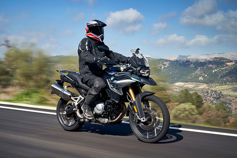 The three new 2020 ‘mid-range’ adventure bikes from Honda, Triumph and Suzuki go head-to-head, on and off-road. We also look at their rivals.