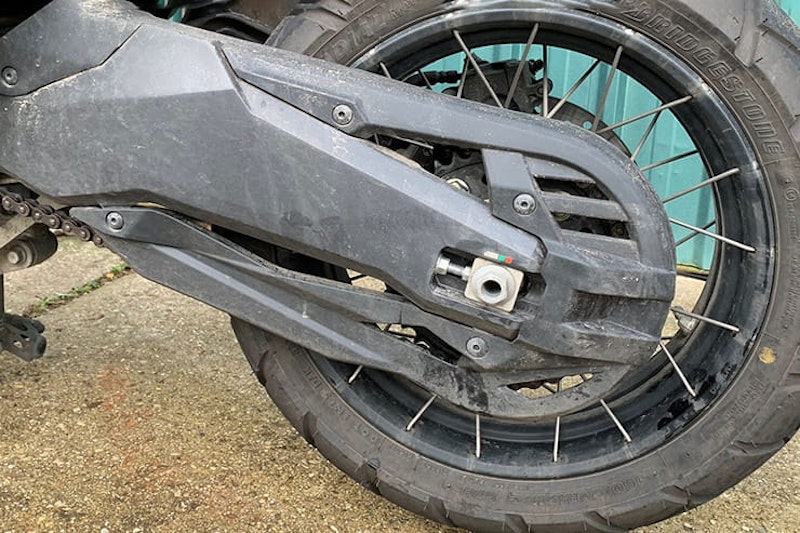 Honda’s 750cc, 75mpg adventure commuter scooter continues to defy convention. But we love it all the same