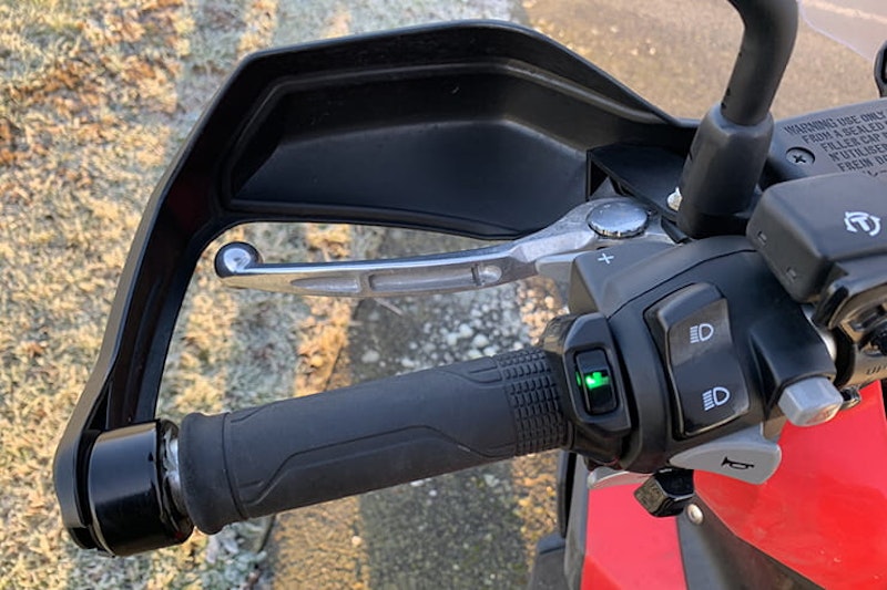 Honda’s 750cc, 75mpg adventure commuter scooter continues to defy convention. But we love it all the same