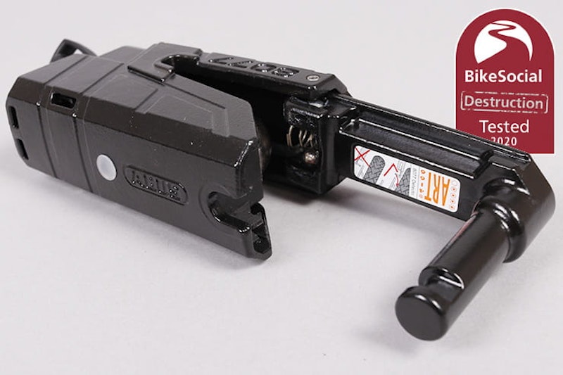 Full destruction review of the alarmed Abus Granit Detecto XPlus 8077 motorcycle disc lock. Cut, smashed and pried to find out if it will protect your bike