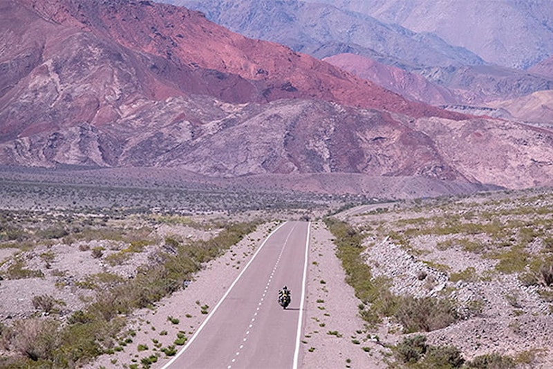 Around the world lap record holder, Nick Sanders, choses his favourite ten roads to ride on and there’s Google Maps links too