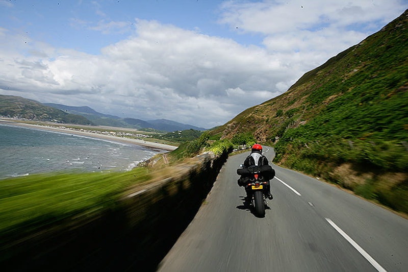 Around the world lap record holder, Nick Sanders, choses his favourite ten roads to ride on and there’s Google Maps links too