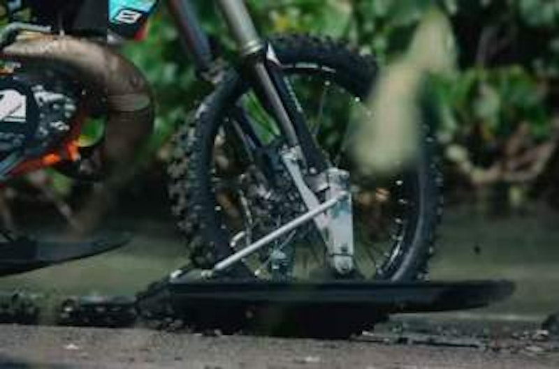 Modified front wheel with ski