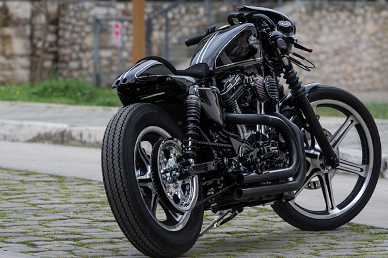 Deep gloss black paint with hints of silver flake alludes to a starry night sky