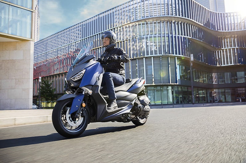 2017 Yamaha X Max 400 riding in a city