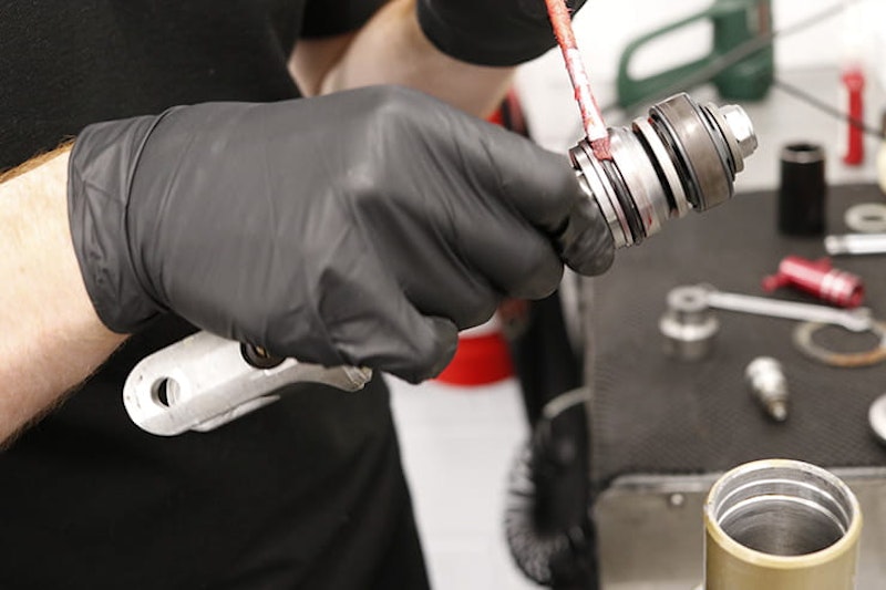 Can you repair the shock absorber on your motorcycle? Bike suspension can often be rebuilt for as-new performance; full review of K-Tech suspension service