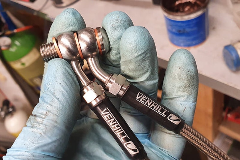 It’s important to change your brake fluid regularly, so understanding how to bleed brakes is vital. Here we’ll also show you how to fit new braided lines…