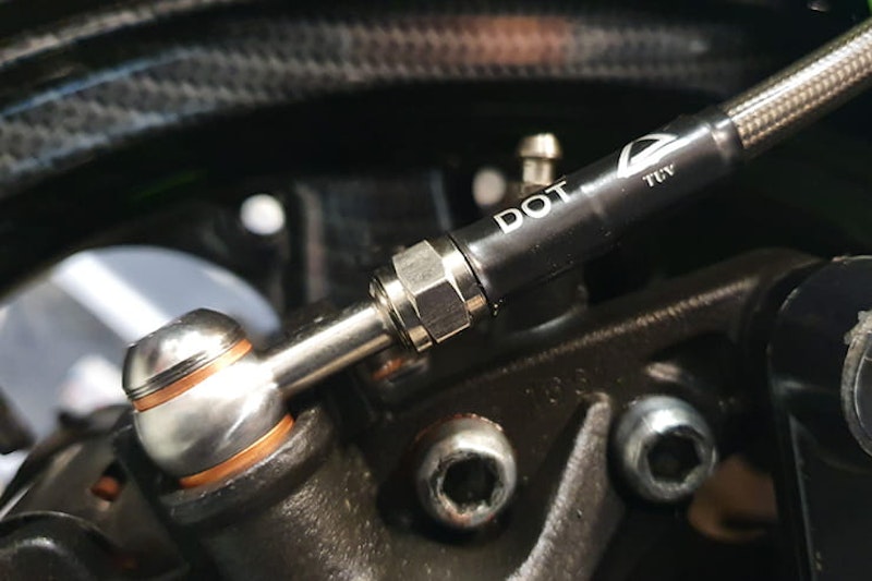It’s important to change your brake fluid regularly, so understanding how to bleed brakes is vital. Here we’ll also show you how to fit new braided lines…