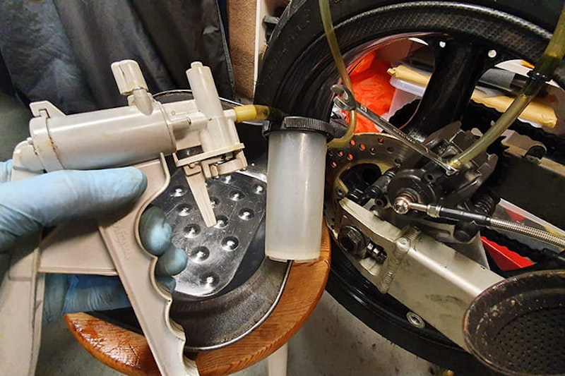 It’s important to change your brake fluid regularly, so understanding how to bleed brakes is vital. Here we’ll also show you how to fit new braided lines…