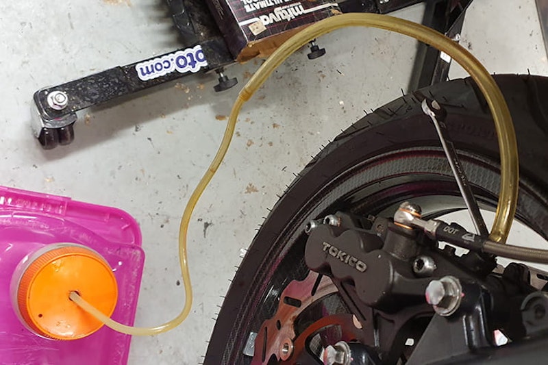 It’s important to change your brake fluid regularly, so understanding how to bleed brakes is vital. Here we’ll also show you how to fit new braided lines…
