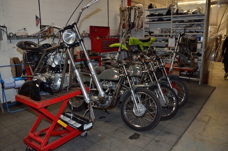 Steve McQueen replicas adorn one corner of the factory
