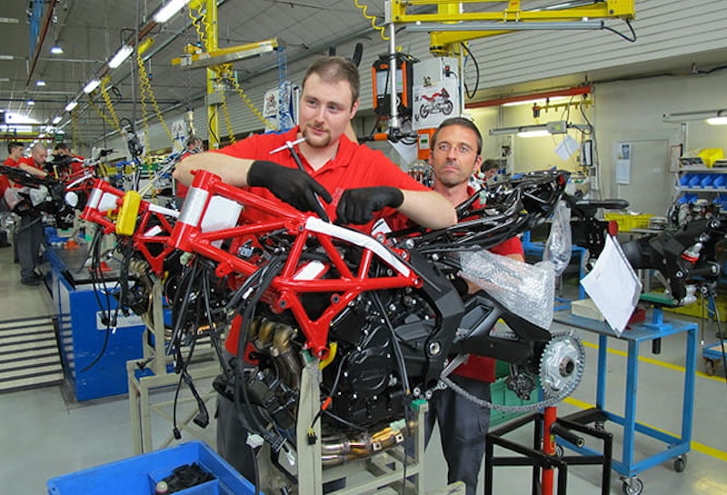 The tiny factory is home to a very hands-on workforce