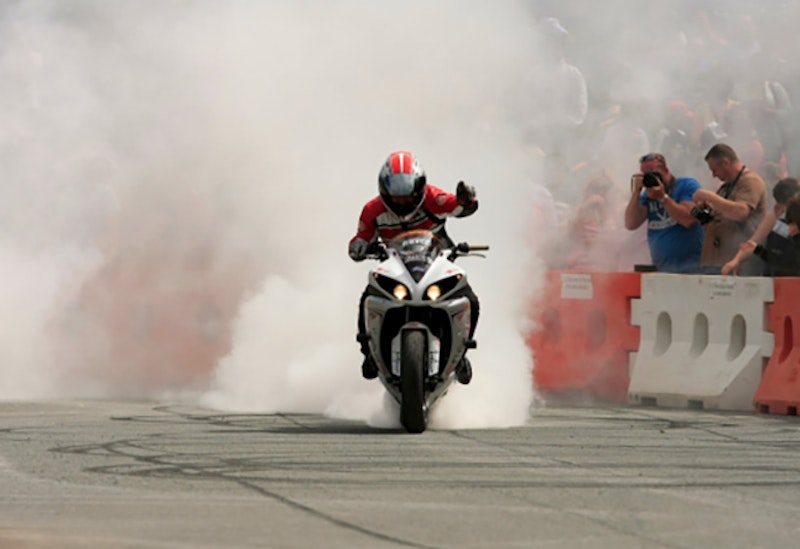 One-handed rolling burn-out on a modified Yamaha R1