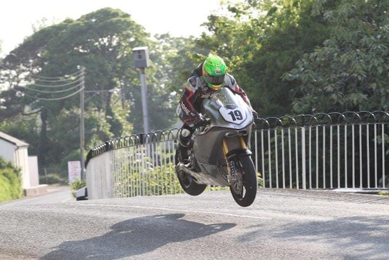 Cameron Donald flies over Ballaugh on Norton's SG3