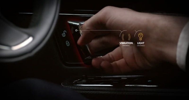 Vibrating door handles alert the driver that a hazard is approaching