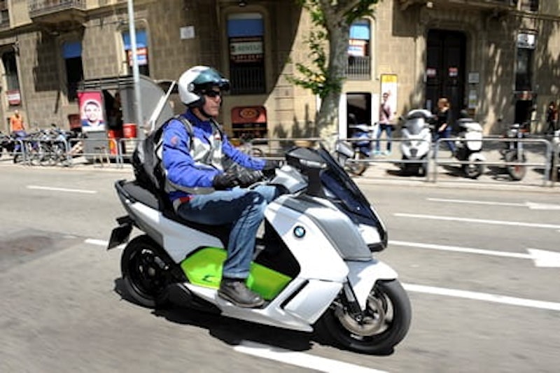 Other scooters look on in amazement