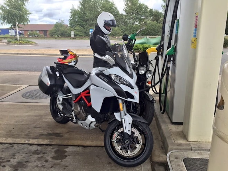 Mann fills-up the Rocket, dreading his pillion ride back to the office. It surprised him how comfortable it was.