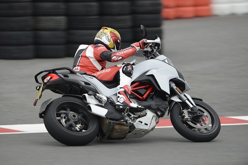 Get on the gas hard even  in a corner and it tears out of a bend using the electronic aids to the full.