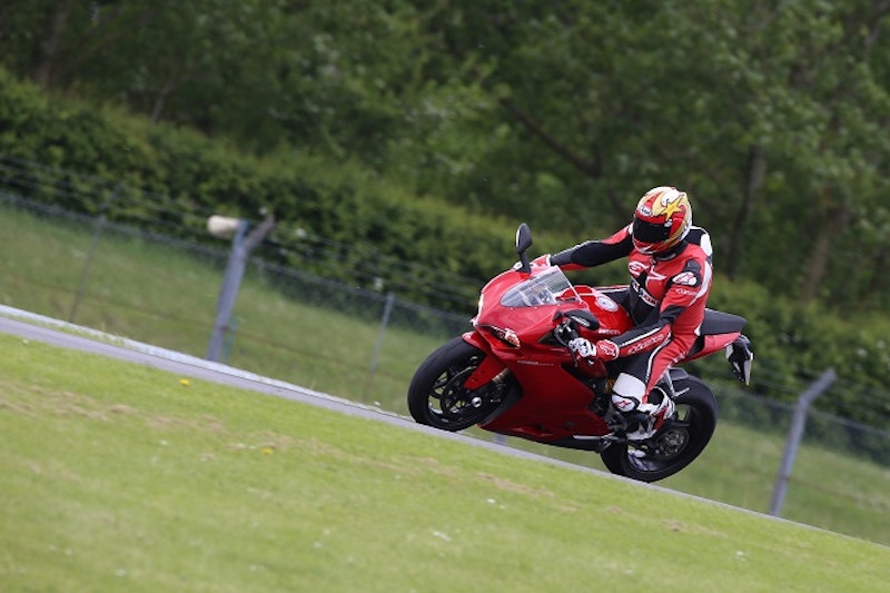 Hard on the brakes and the ABS sorts out your corner entry. The forks need stiffening up a bit for the track though.