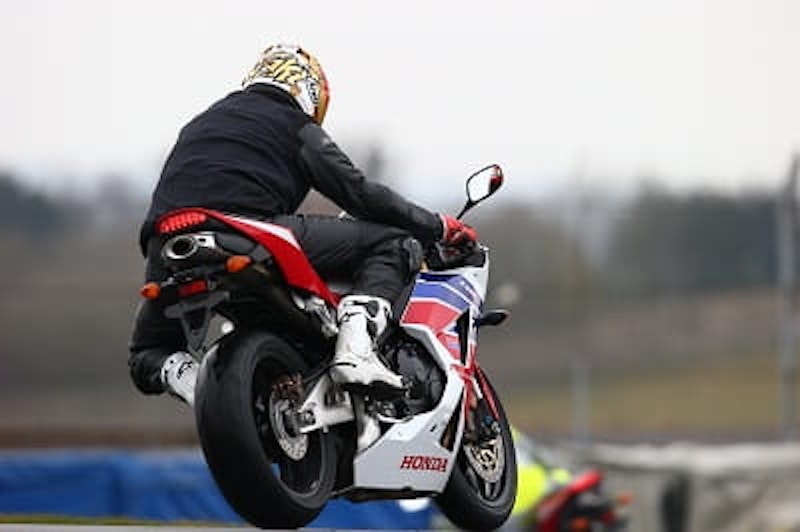 Don't laugh, even Ron Haslam couldn't get it leant over. The CBR's rear-end looks fantastic, with underseat exhaust and a neat LED rear light. Potter focuses on pulling in the next rider in the who dares to be brave in the wet competition.
