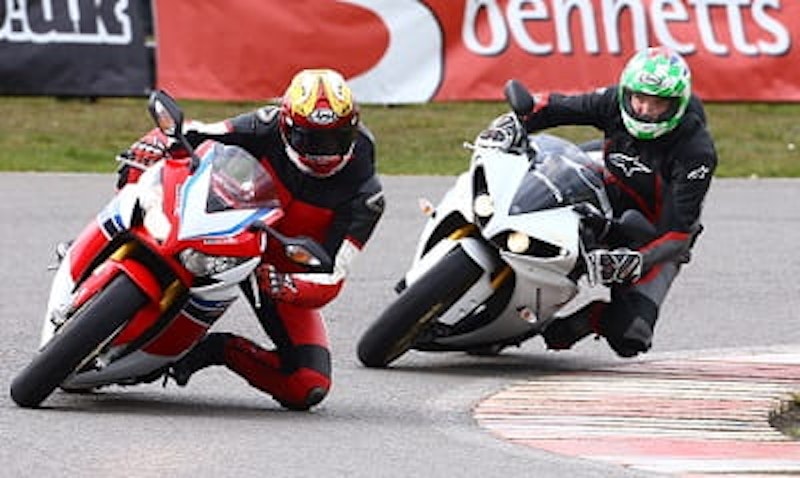 Two old dogs dual it out. The bikes aren't bad either.