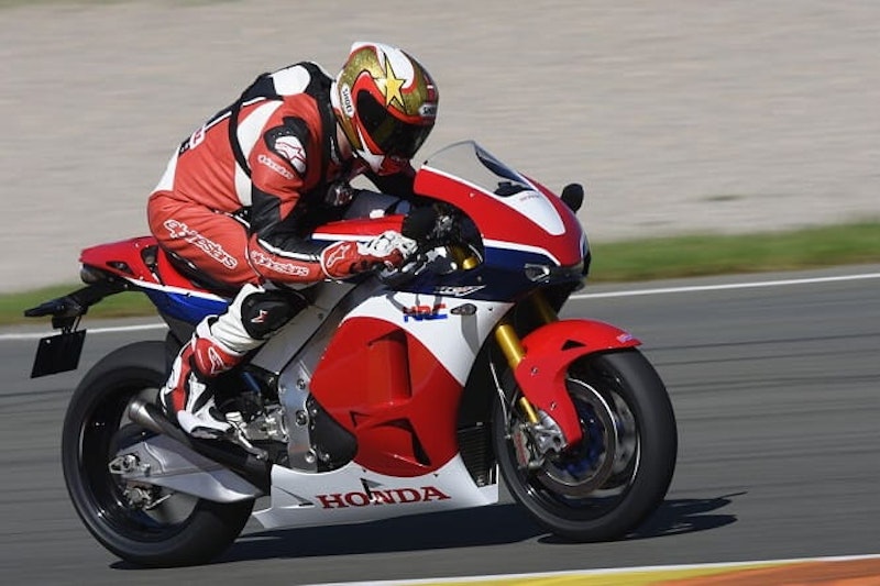 A MotoGP-derived motorcycle and an empty Grand Prix circuit. This is what dreams are made of.