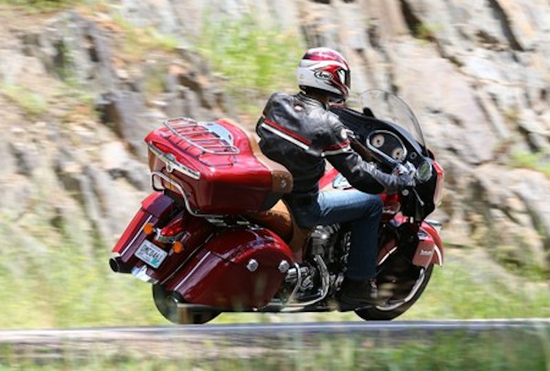 Two full faced helmets will fit in the top box