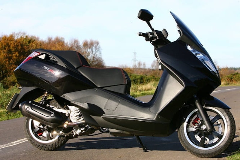 244cc, liquid-cooled, 4-valve, 4-stroke is smooth and torquey