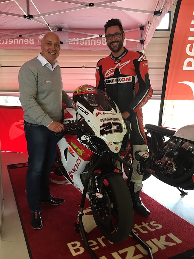 Halsall Racing team owner, Martin Halsall forces a smile as he prepares to let Bike Social's Marc Potter loose on his race bike